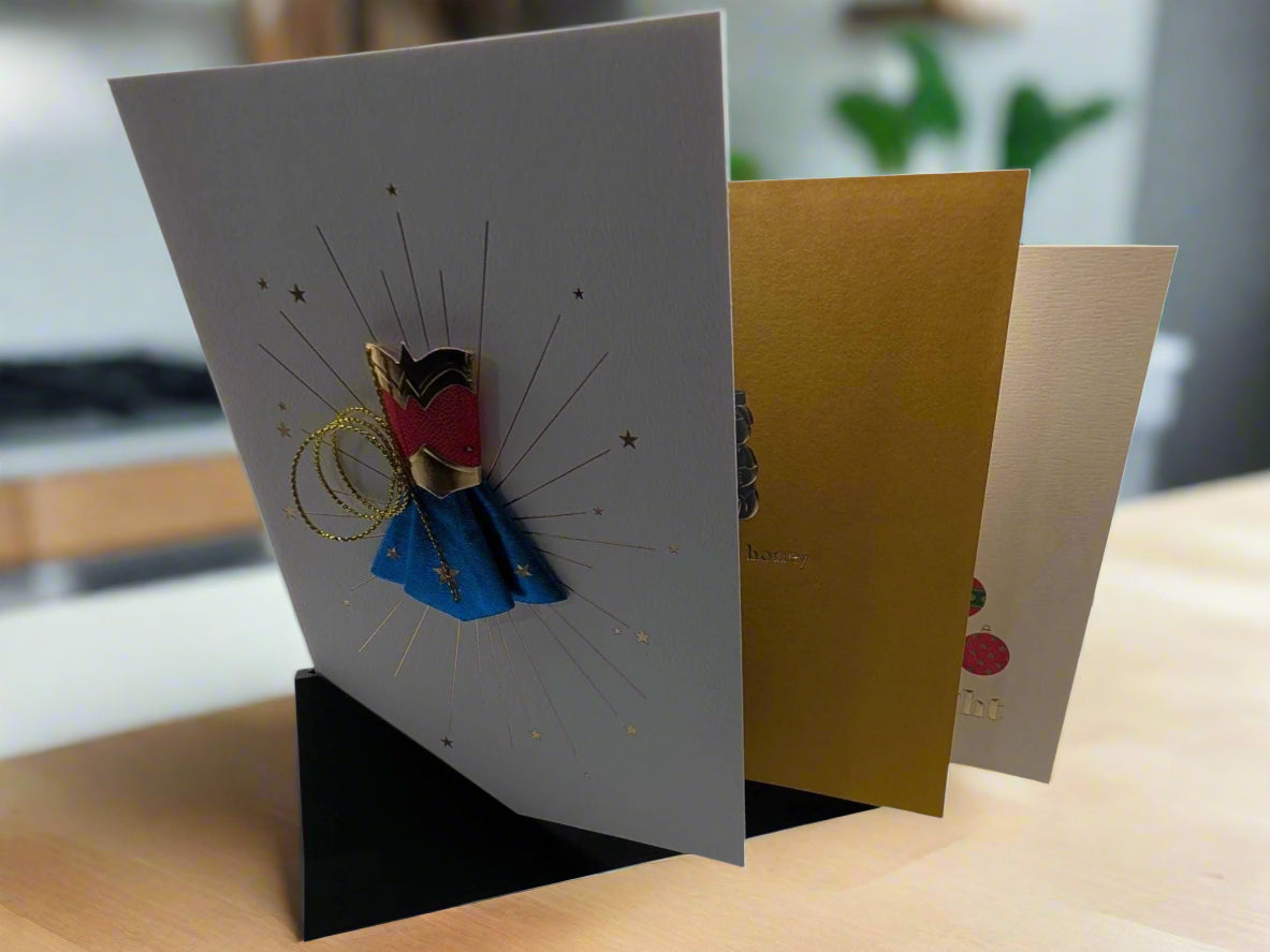 Side view of Modern Card Holder with 3 cards in open position.