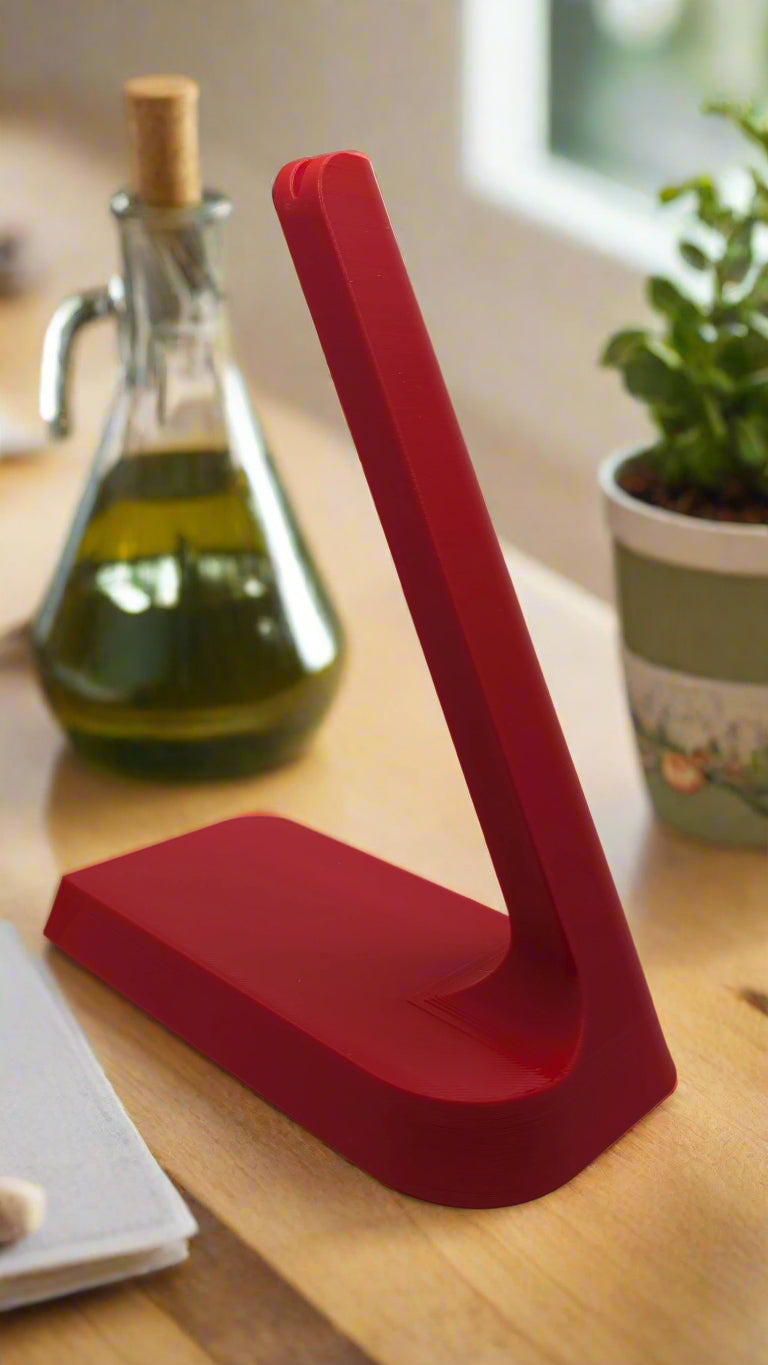 Red Shokz headphone charging stand.
