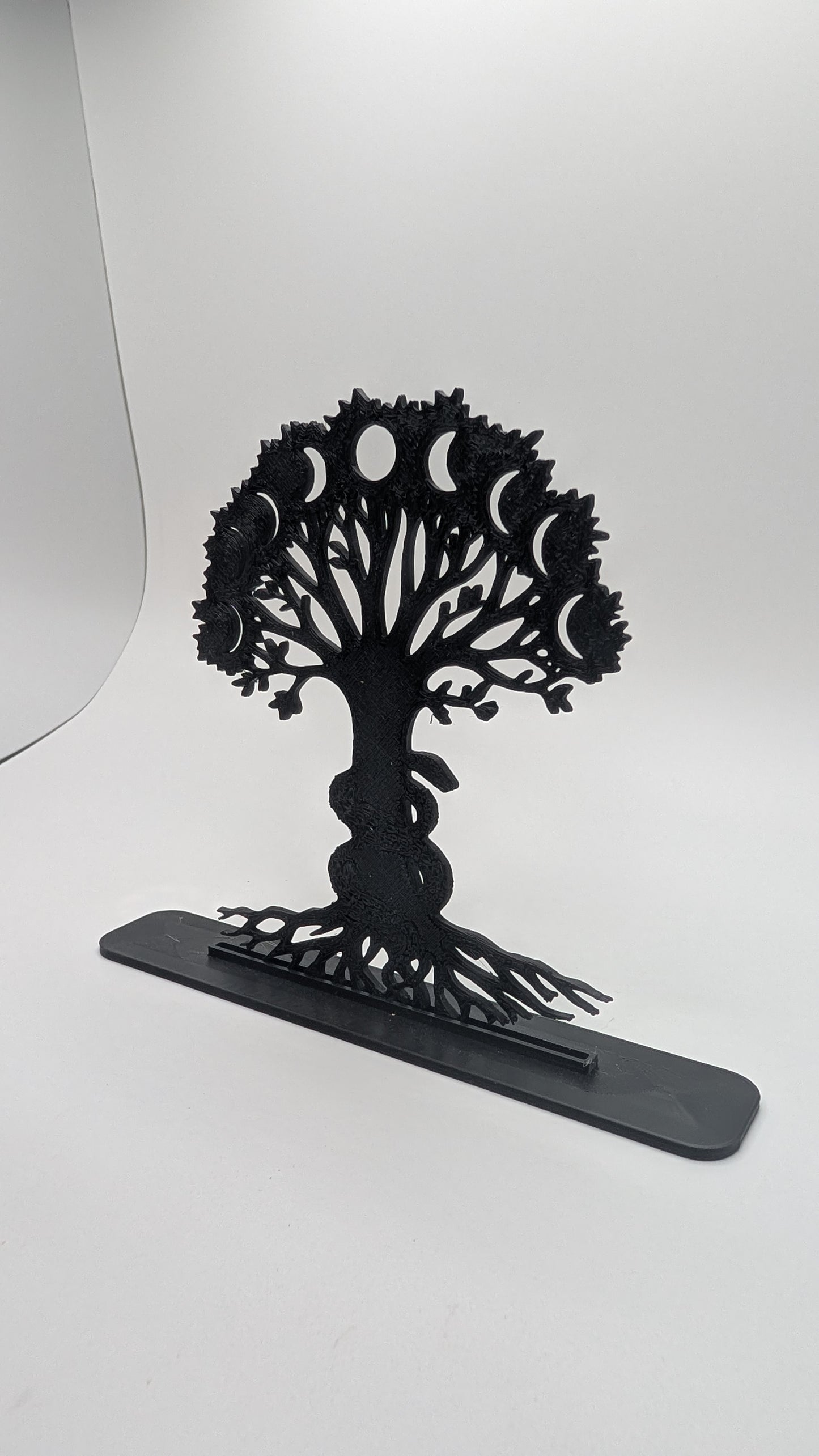 Black Tree of Life decorative sculpture with celestial moon phases and serpent design, 3D-printed spiritual home decor accent